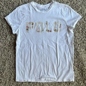 New without tags Polo tee in white with floral sequin logo detail